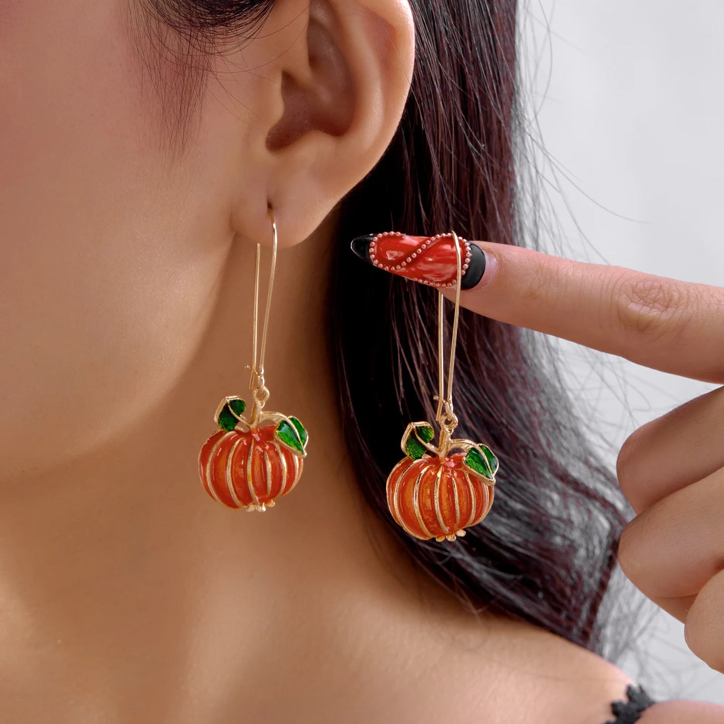 Playful Pumpkin & Skull Dangle Earrings™